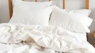 lavar a roupa de cama